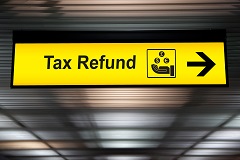 Unclaimed tax refund sign.